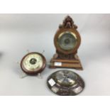 AN OAK CASED TABLE BAROMETER, TWO OTHER BAROMETERS AND A TRAY