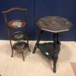 A CARVED OAK OCCASIONAL TABLE AND A MAHOGANY CAKE STAND