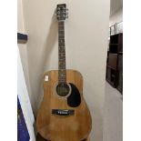 AN ENCORE ACOUSTIC GUITAR