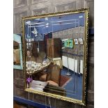 A GILT FRAMED WALL MIRROR AND ANOTHER