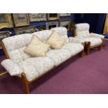 A RETRO UPHOLSTERED THREE SEAT SETTEE AND ARMCHAIR