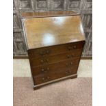 A STAINED WOOD WRITING BUREAU AND A CHEST OF DRAWERS