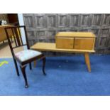 A TEAK TELEPHONE TABLE AND A MAHOGANY CHAIR