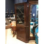 A MAHOGANY TWO STAGE CORNER CUPBOARD