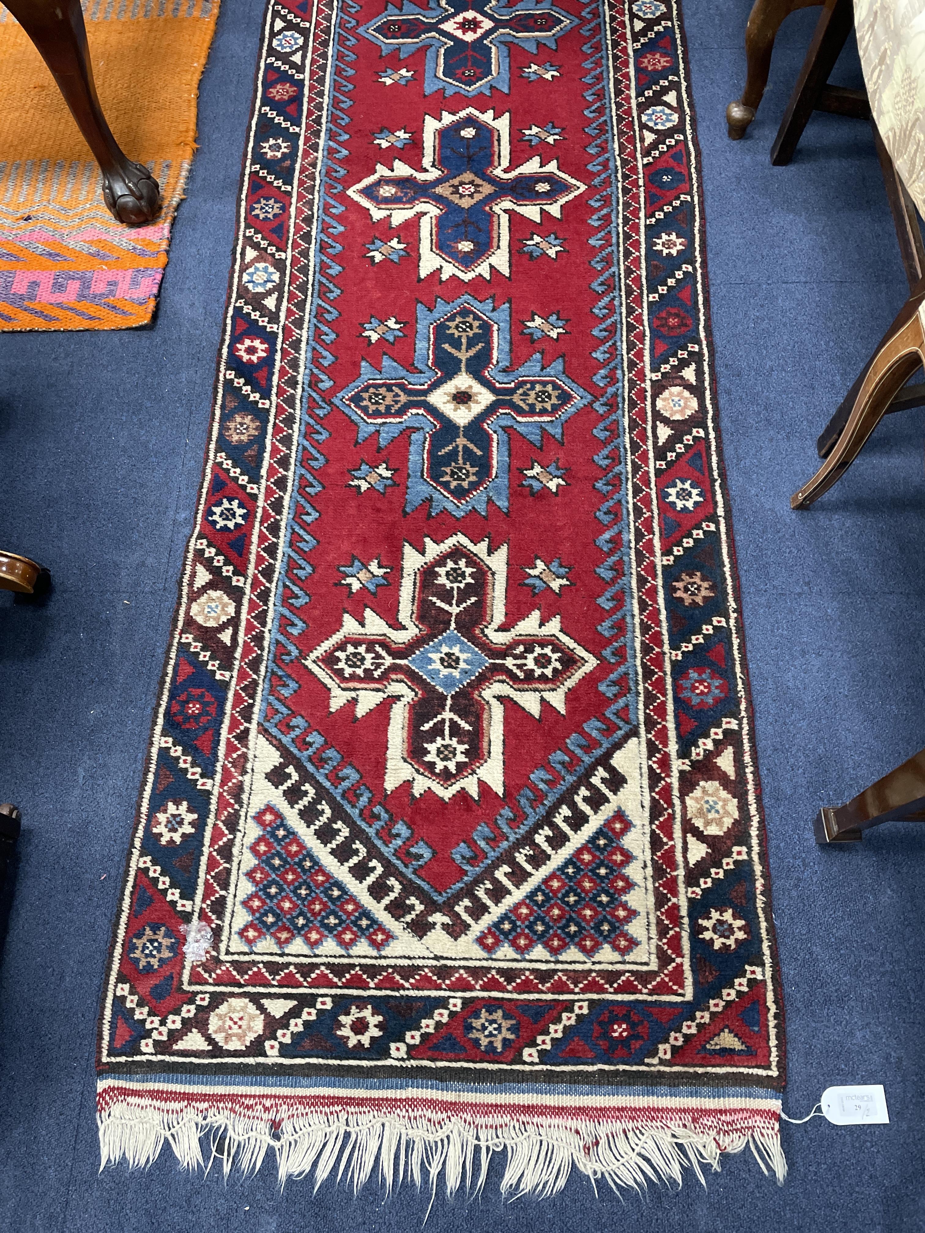 A MIDDLE EASTERN FRINGED AND BORDERED RUNNER AND A RUG - Image 2 of 4