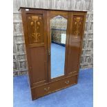 AN INLAID MAHOGANY WARDROBE