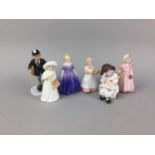 A ROYAL DOULTON FIGURE OF 'STORYTIME' AND FIVE OTHERS