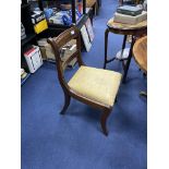 AN OAK ELBOW CHAIR AND TWO MAHOGANY SINGLE CHAIRS