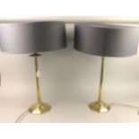 A PAIR OF BRASS CANDLESTICK TABLE LAMPS