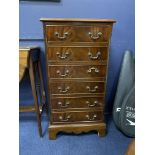 A MAHOGANY CHEST OF SIX DRAWERS