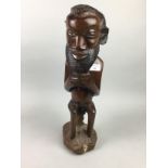 AN AFRICAN HARDWOOD FIGURE OF A GENTLEMAN AND TWO OTHER CARVINGS