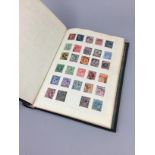 A STAMP ALBUM CONTAINING BRITISH & EUROPEAN STAMPS