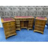 A MAHOGANY REPRODUCTION WRITING DESK AND TWO FILING CABINETS