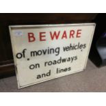 A PAINTED WOOD WARNING SIGN