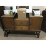 AN EARLY 20TH CENTURY OAK SIDEBOARD