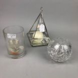 A SET OF FIVE CLEAR GLASS CANDLE HOLDERS