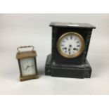 A BLACK SLATE MANTEL CLOCK AND A BAYARD CARRIAGE CLOCK