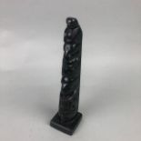 A SMALL CANADIAN BLACK ONYX TOTEM