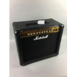 A MARSHALL AMPLIFIER, ALONG WITH OTHER EQUIPMENT