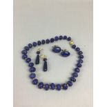 A COLLECTION OF LAPIS LAZULI ITEMS