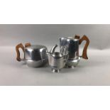 A PICQUOT FOUR PIECE TEA SERVICE AND SILVER PLATED WINE SLIDES
