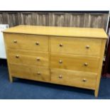 AN OAK CHEST OF SIX DRAWERS