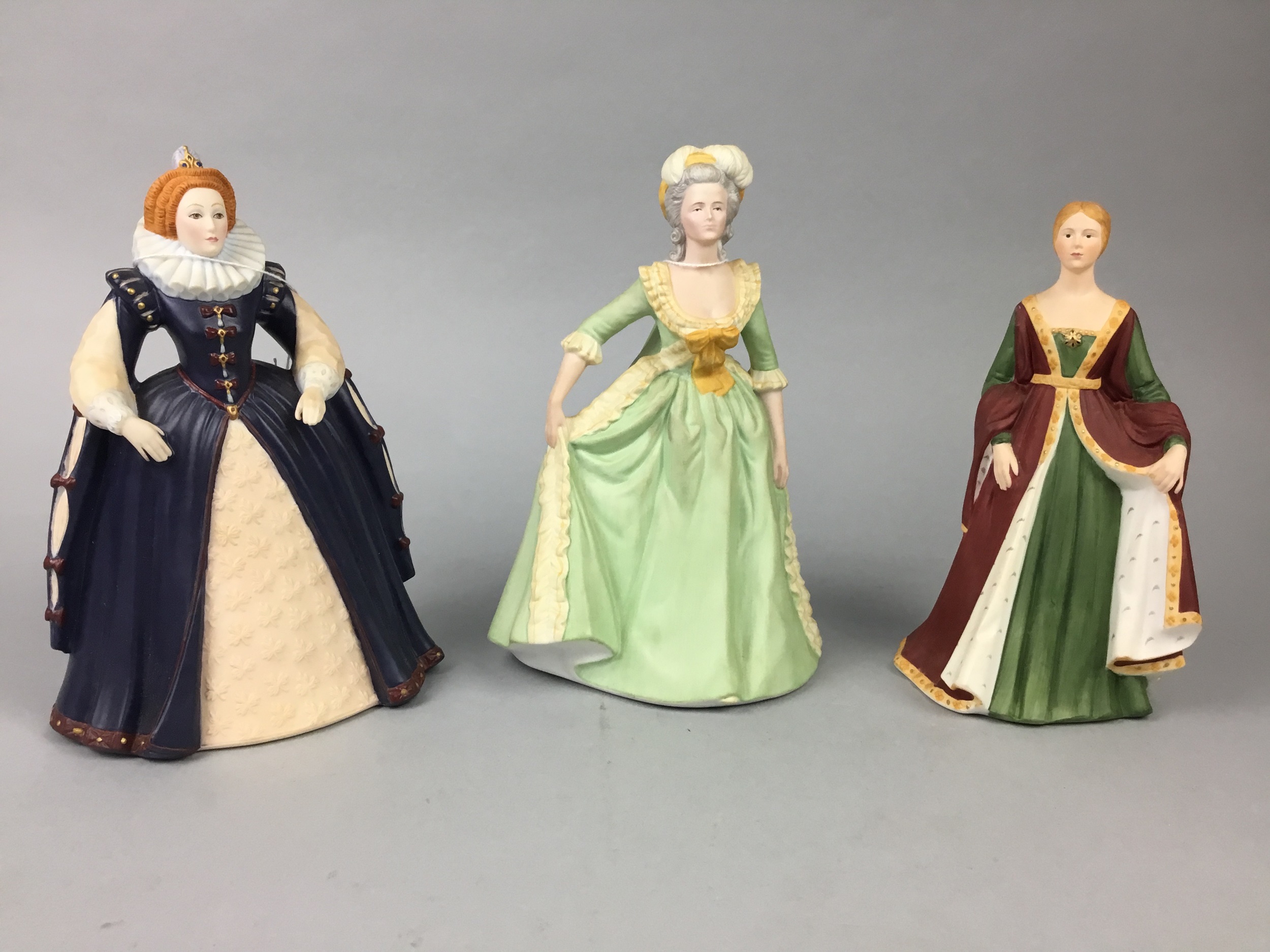 A LOT OF THREE FRANKLIN MINT FIGURES OF LADIES