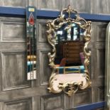 A GILT FRAMED WALL MIRROR AND A SMALLER RECTANGULAR MIRROR