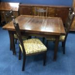 A MAHOGANY EXTENDING DINING TABLE AND FOUR CHAIRS