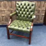 A 20TH CENTURY BUTTON BACK GREEN LEATHER OPEN ELBOW CHAIR