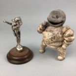 A MICHELIN MAN MASCOT, ALONG WITH ANOTHER