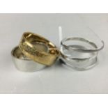 A VICTORIAN SILVER BANGLE AND TWO OTHERS