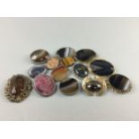 A LOT OF HARDSTONE BROOCHES