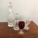 A GLASS DECANTER, SUNDAE DISHES AND COLOURED GLASS GLASSES