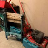 A BRIGGS & STRATTON COUNTAX LAWNMOWER AND OTHER TOOLS