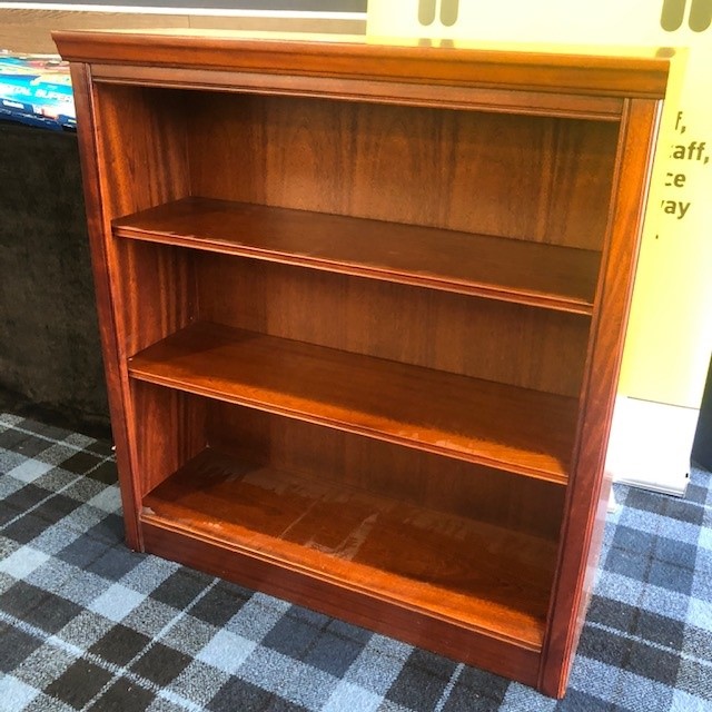 A MODERN MAHOGANY OPEN BOOKCASE