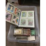 A LOT OF TWO ALBUMS OF PICTURE STAMP CARDS, MIXED COINS AND POSTCARDS