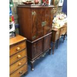 A MAHOGANY REPRODUCTION COCKTAIL CABINET