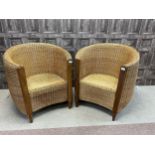 A PAIR OF MODERN BASKET TUB CHAIRS