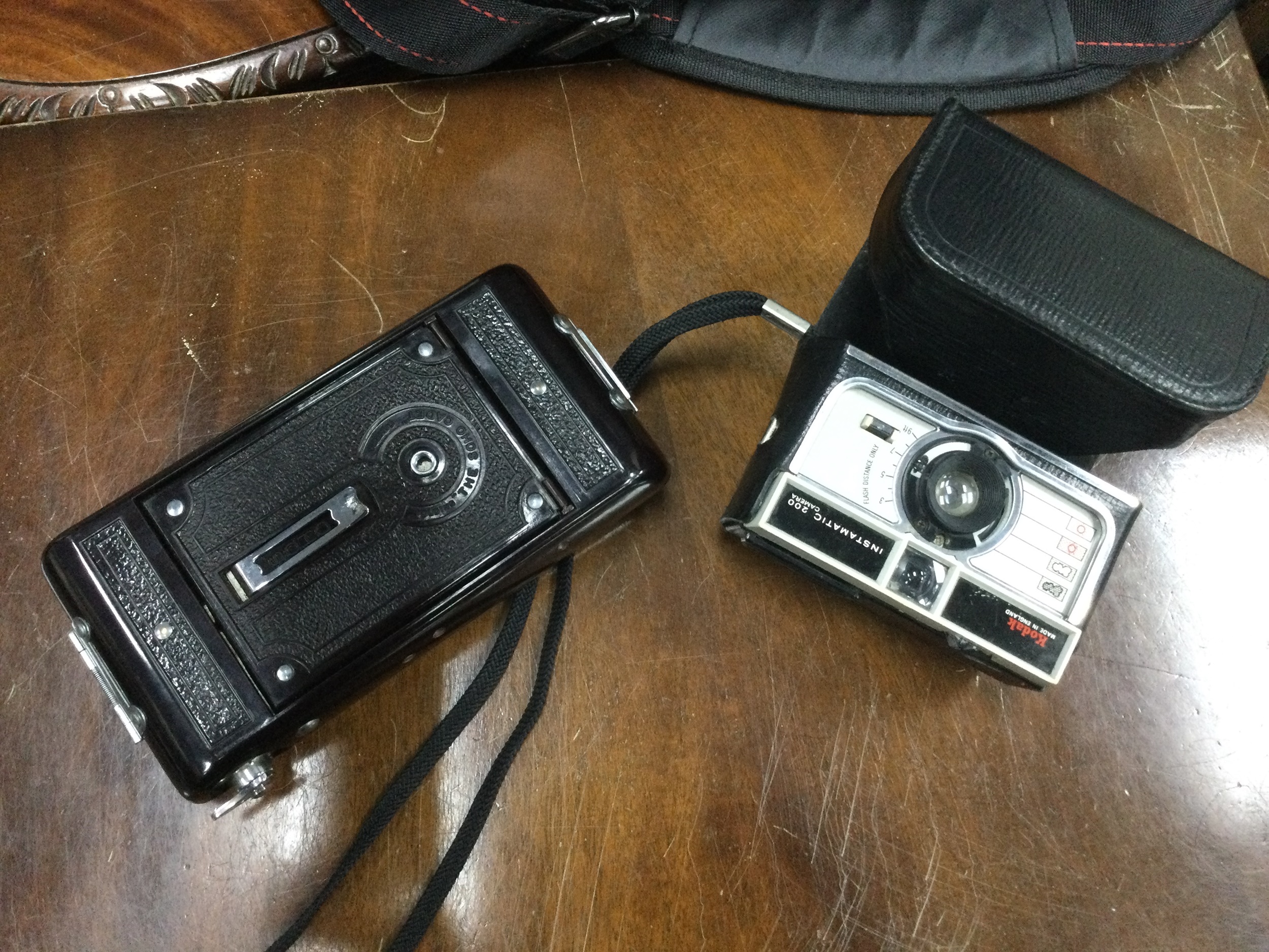 A BOXED CAMERA IN CASE AND A KODAK CAMERA