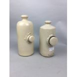 A GOVANCROFT POTTERY STONEWARE HOT WATER BOTTLE, ANOTHER AND WOOD ITEMS