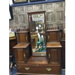 A LATE VICTORIAN MAHOGANY AND WALNUT DUTCHESS DRESSING TABLE