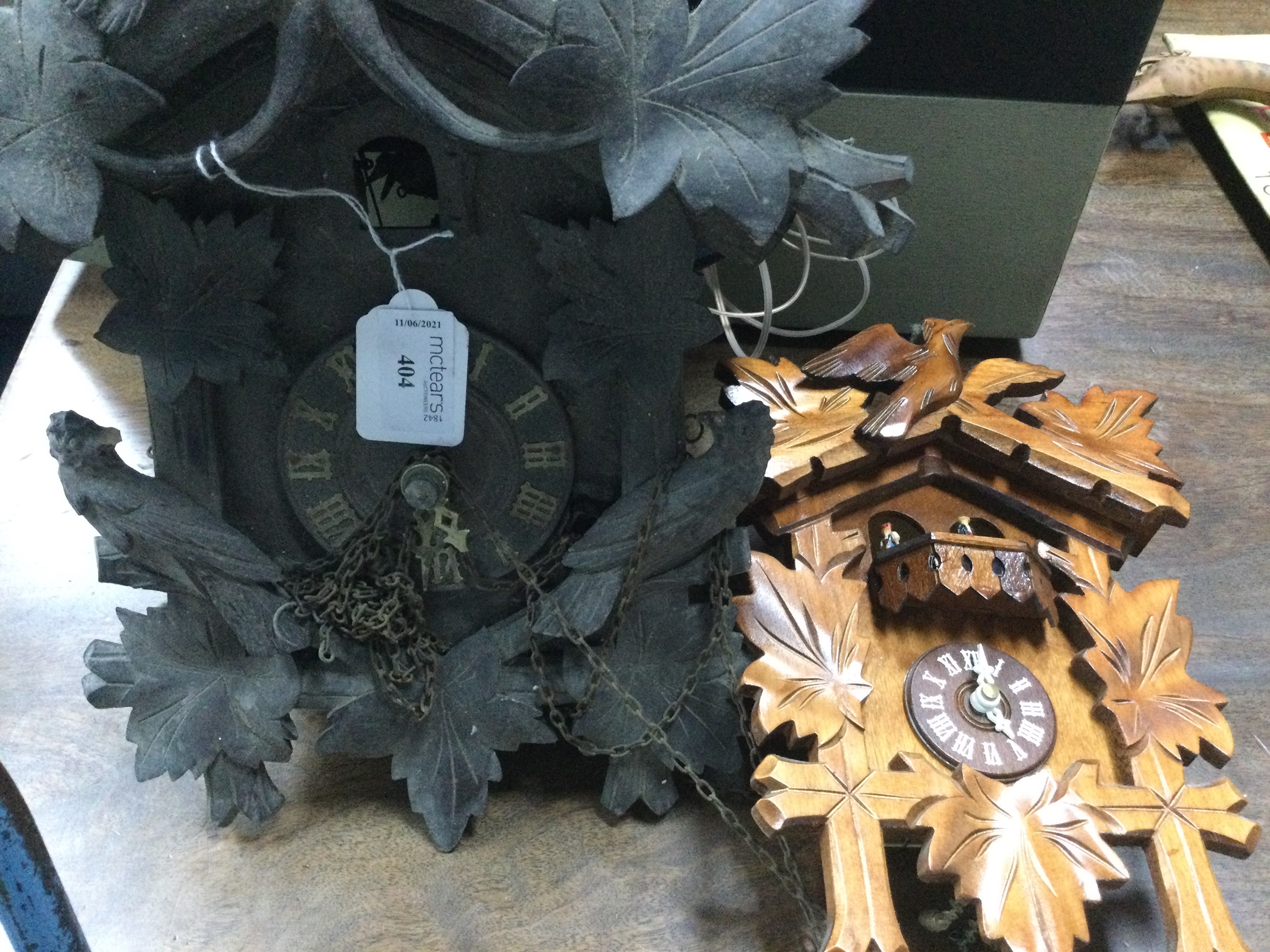 A LOT OF TWO CUCKOO CLOCKS