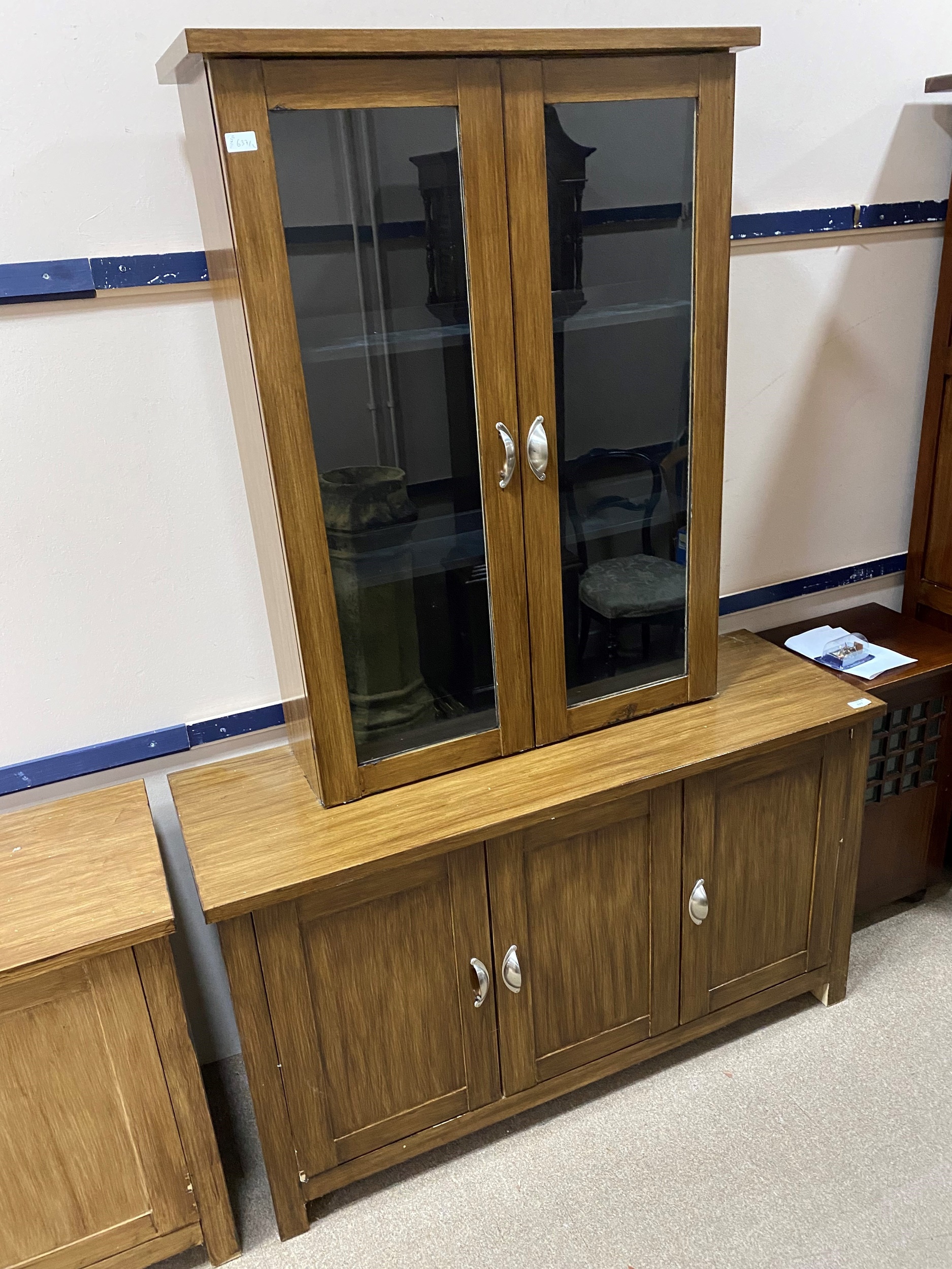 A STAINED WOOD SIDEBOARD AND A MATCHING CUPBOARD