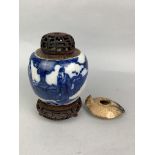 A CHINESE BLUE AND WHITE GINGER JAR AND A ROMAN OIL LAMP