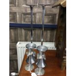 THREE PAIRS OF STAINLESS STEEL CANDLESTICKS