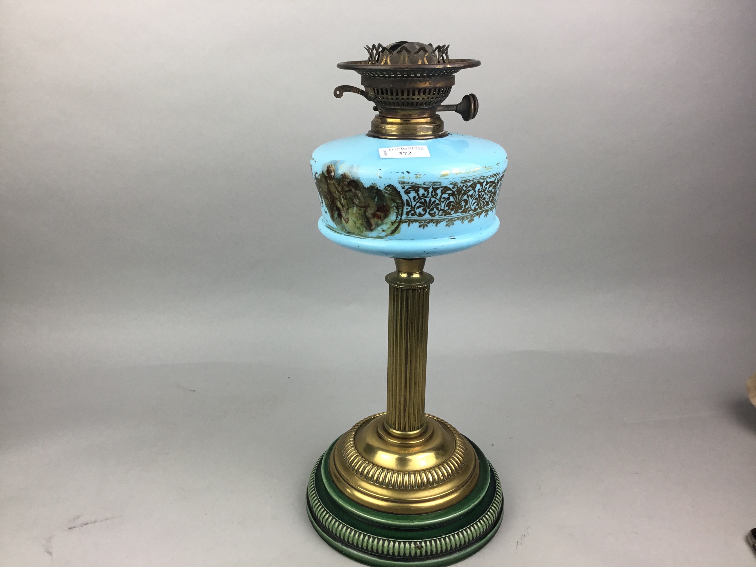 A VICTORIAN OIL LAMP