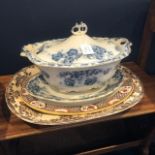 A LATE VICTORIAN BLUE AND WHITE STONEWARE TUREEN WITH COVER AND SERVING DISHES