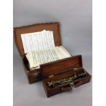 A CASED CLARINET, SHEET MUSIC IN A LEATHER CASE AND VARIOUS SPORTS EQUIPMENT