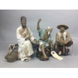 A LOT OF THREE CHINESE GLAZED POTTERY SEATED FIGURES